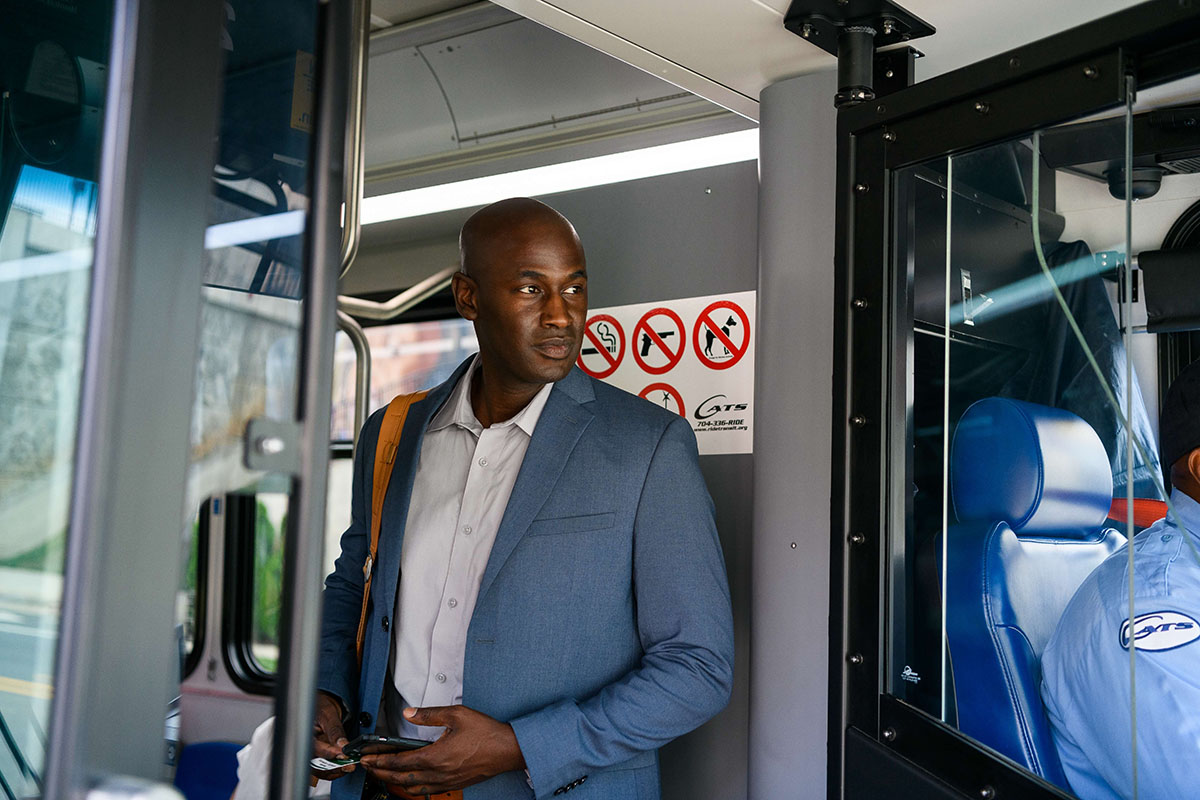 Man boarding the bus.